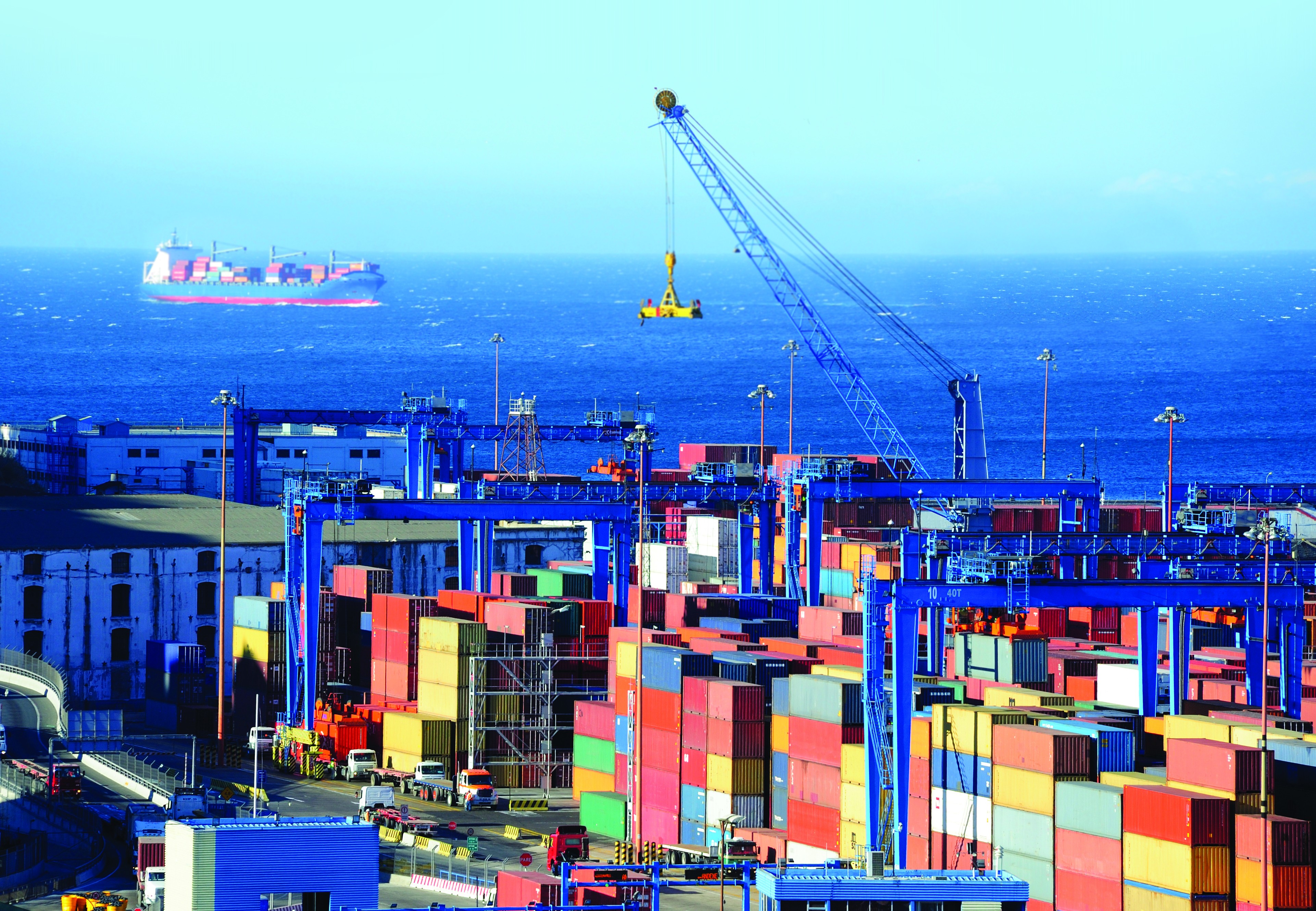 Shipping port containers cargoship in Chile_extended sky_repositioned ship